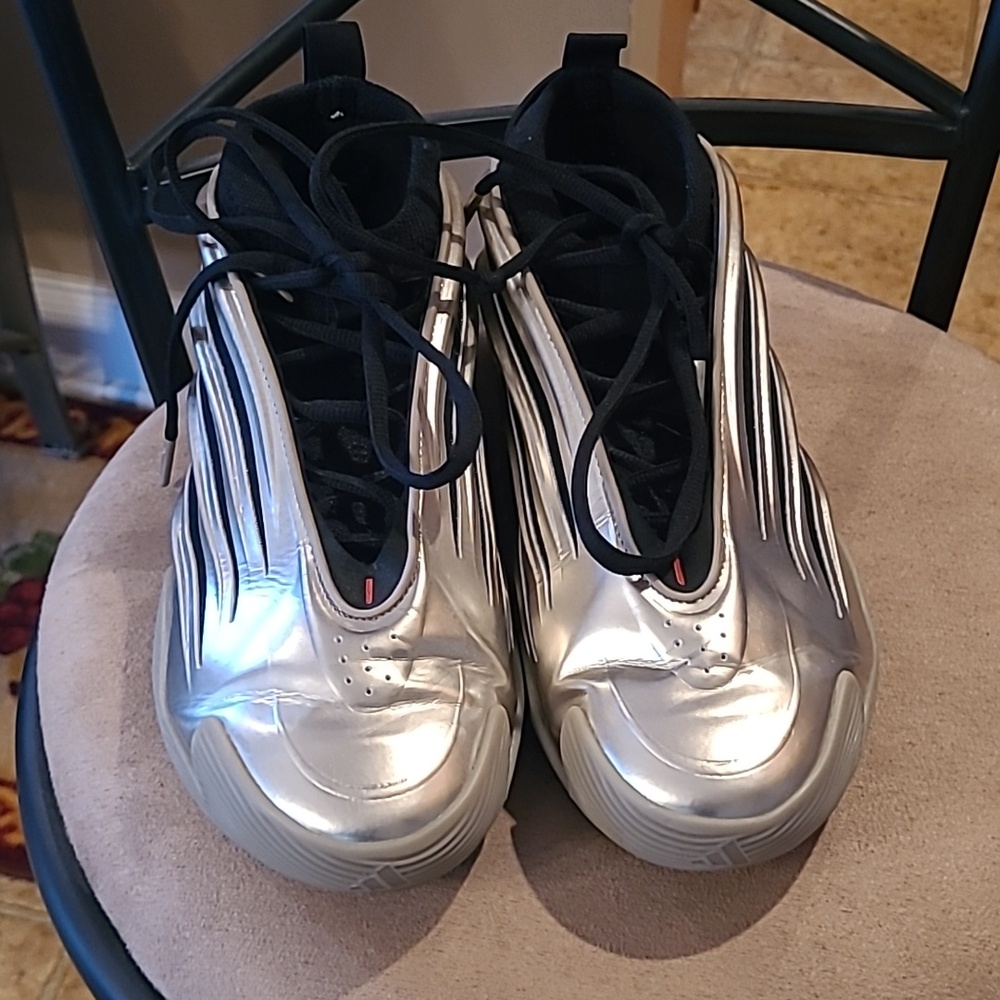 Adidas Gold and Black Sneakers Sleek Metallic Design